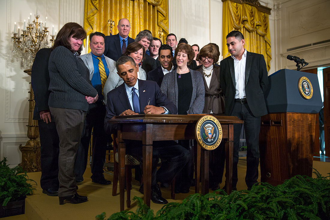奧巴馬簽署總統備忘，提高加班費 圖片來源：美國白官