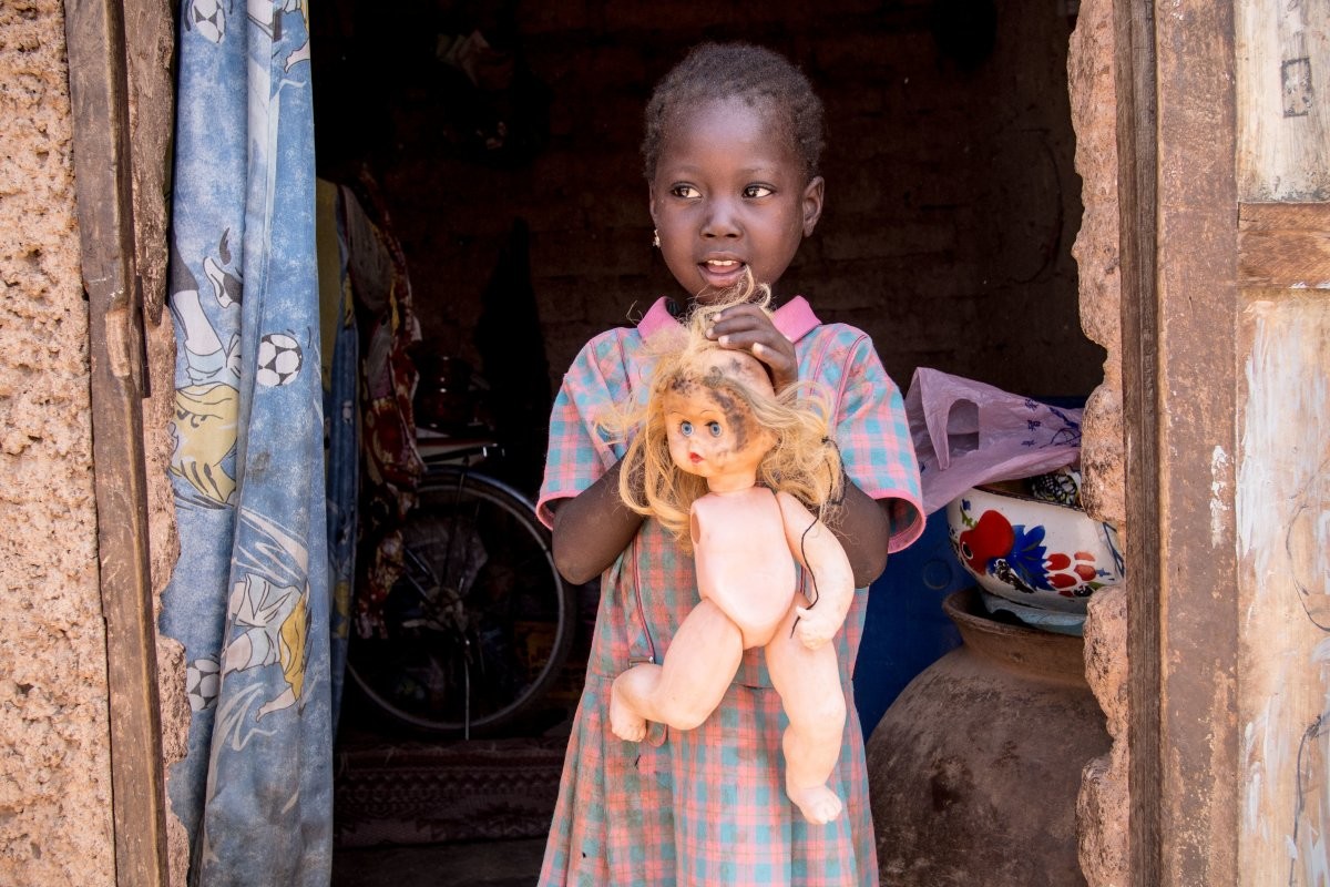in-a-burkinabe-home-living-on-45month-per-adult-the-favorite-toy-is-a-broken-plastic-doll