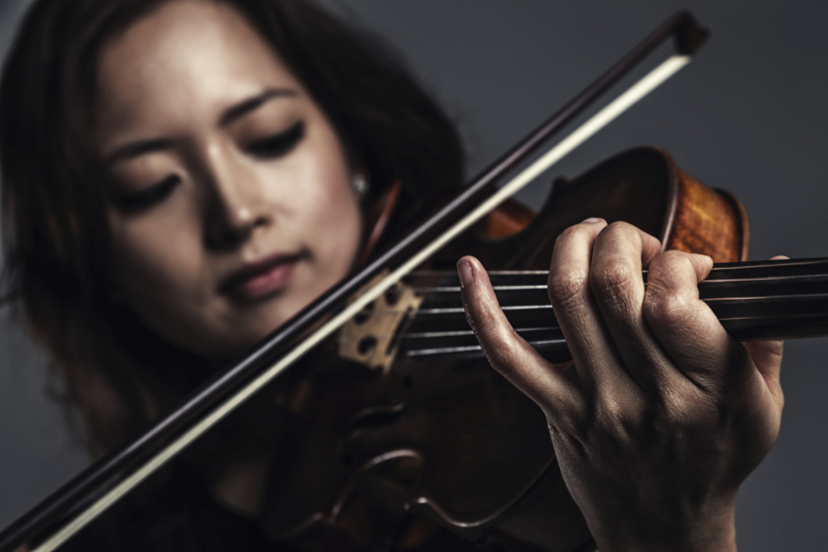 Female Violinist Playing Violin