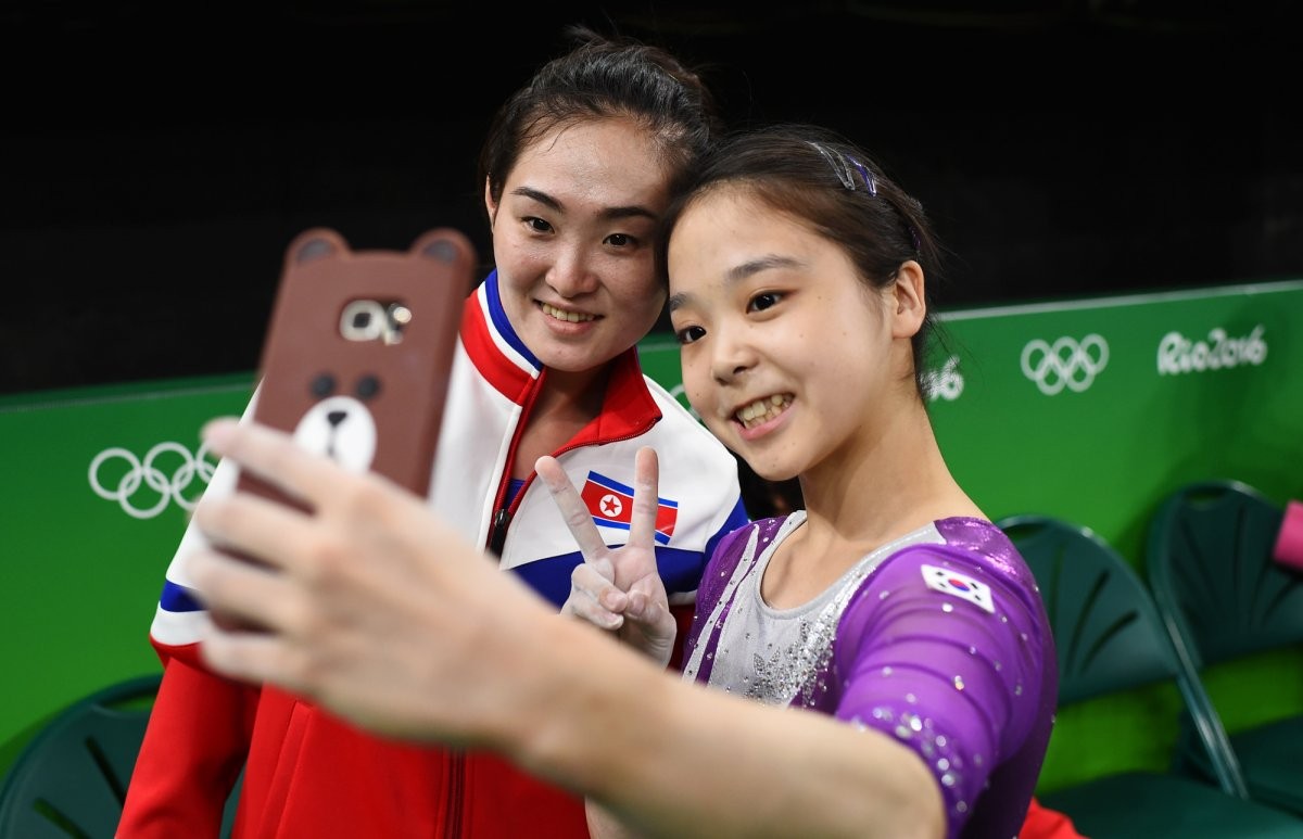 lee-eun-ju-of-south-korea-right-takes-a-selfie-with-hong-un-jong-of-north-korea-left-during-the-olympic-games