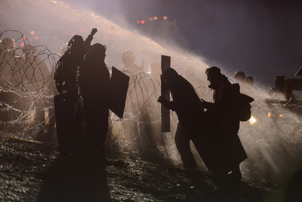 police-use-a-water-cannon-on-protesters