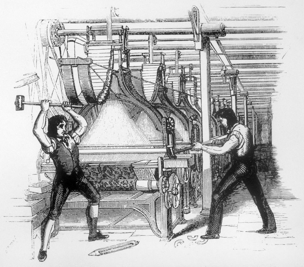 19 世紀初的盧德分子恐防紡織機將取代人手造成失業潮，發起破壞機械行動。　圖片來源：維基百科