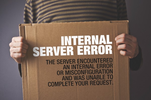 Http Error 500, Server error page concept. Man holding banner with error message. Web technology series.