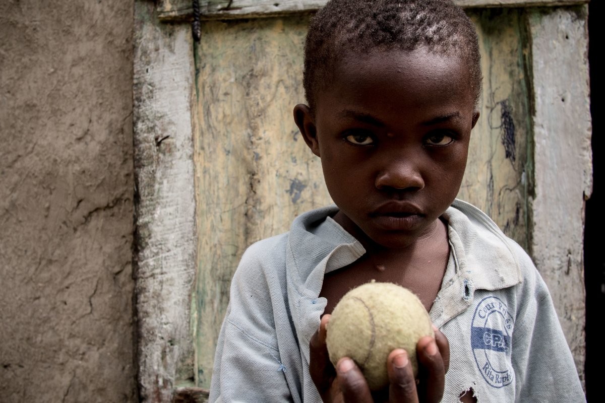 in-a-haitian-home-living-on-39month-per-adult-the-favorite-toy-is-a-tennis-ball